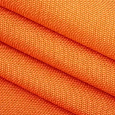 an image of the Canvas Tangerine cover by Sunbrella